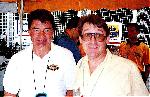 Avec le champion cycliste Raymond Poulidor (1992)